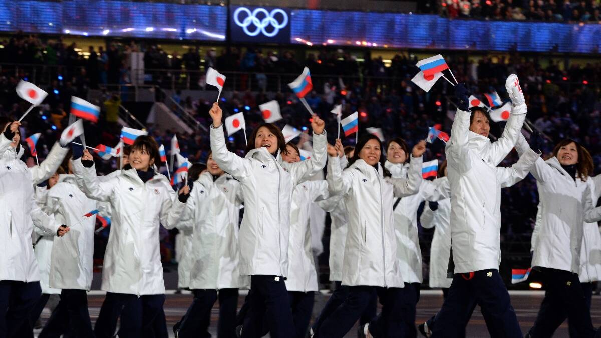 The Japanese Olympic team waves to the crowd during the opening ceremony of the Sochi 2014 Winter Olympics. Picture: Getty