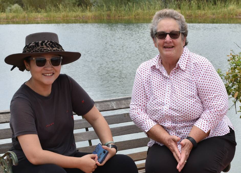 Ms Miao Wang and Flinders Mayor Jane McNamara discussing the meatworks facility in Hughenden this week. 