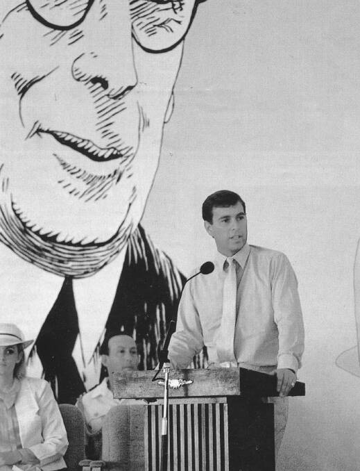 Under a mural of John Flynn, HRH Prince Andrew the Duke of York addresses guests at the opening of John Flynn Place in Cloncurry in October 1988.