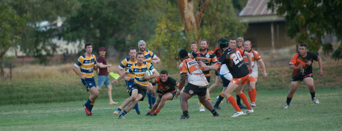 BLOCK: Warrigals maintained a strong defence to triumph over Cloncurry 13-10 on Saturday night. Picture: Kerry Brisbane. 