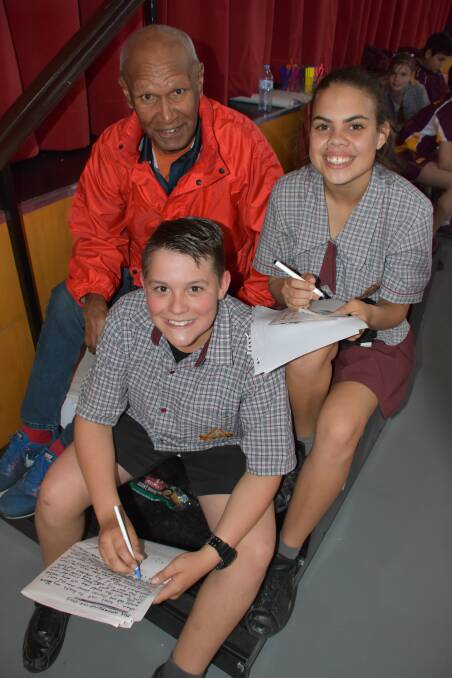 NEW SKILLS: Boori Monty Pryor with Year 8 students Darcy Webber and Cordel Gosbee. Picture: Lydia Lynch. 