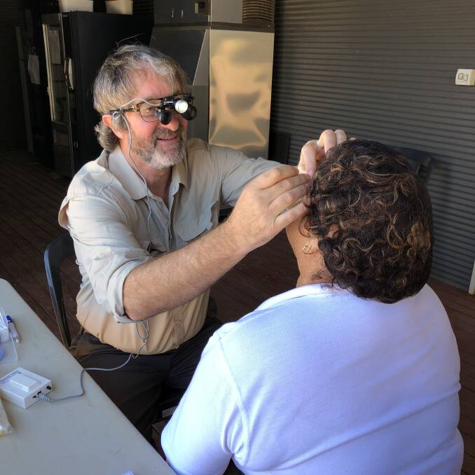 EYE CHECK: Dr Garry Brian checking for signs of trachoma in Camooweal this week. Picture: supplied. 