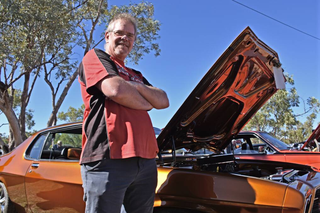 PRIDE AND JOY: Tom Martens strikes a pose with his 1974 Holden Monaro. Picture: Lydia Lynch. 