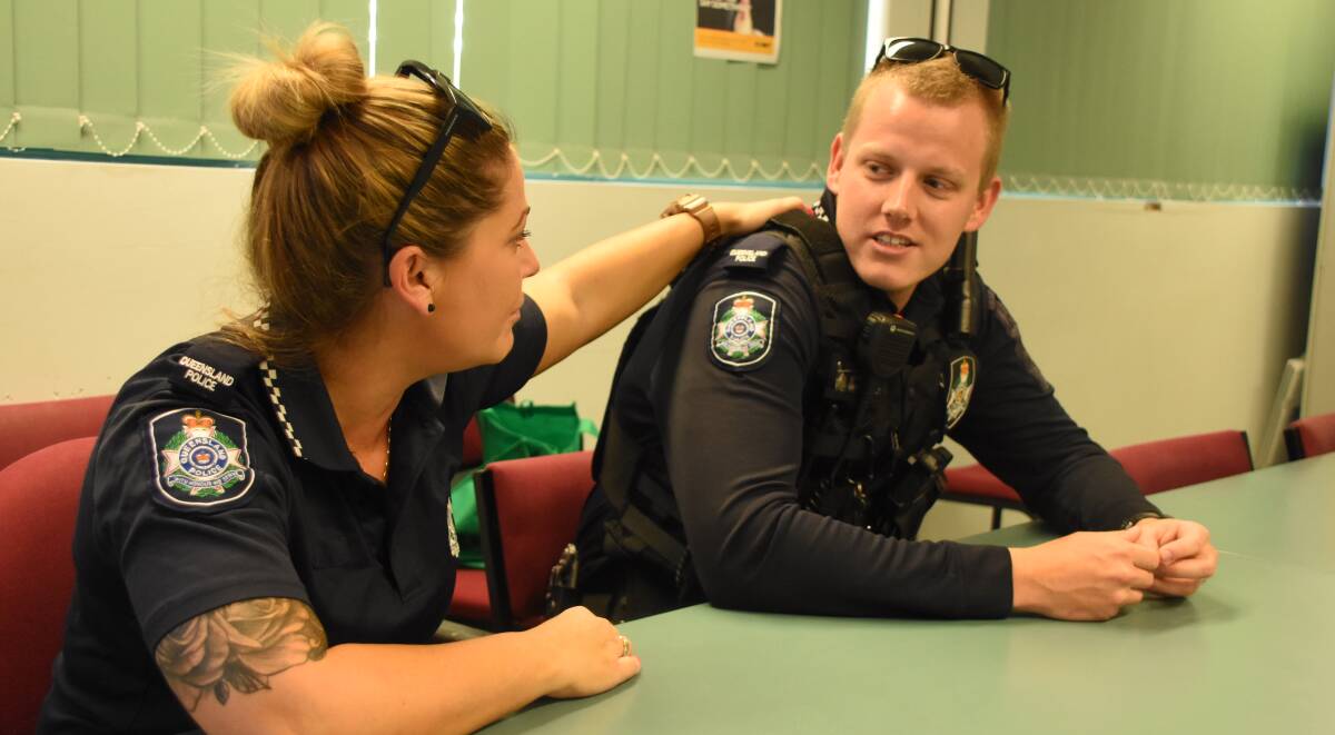MATES: Mount Isa Constables Nadine Godwin and Oliver Harvey-Walker check up on each other during mental health week. Picture: Lydia Lynch.