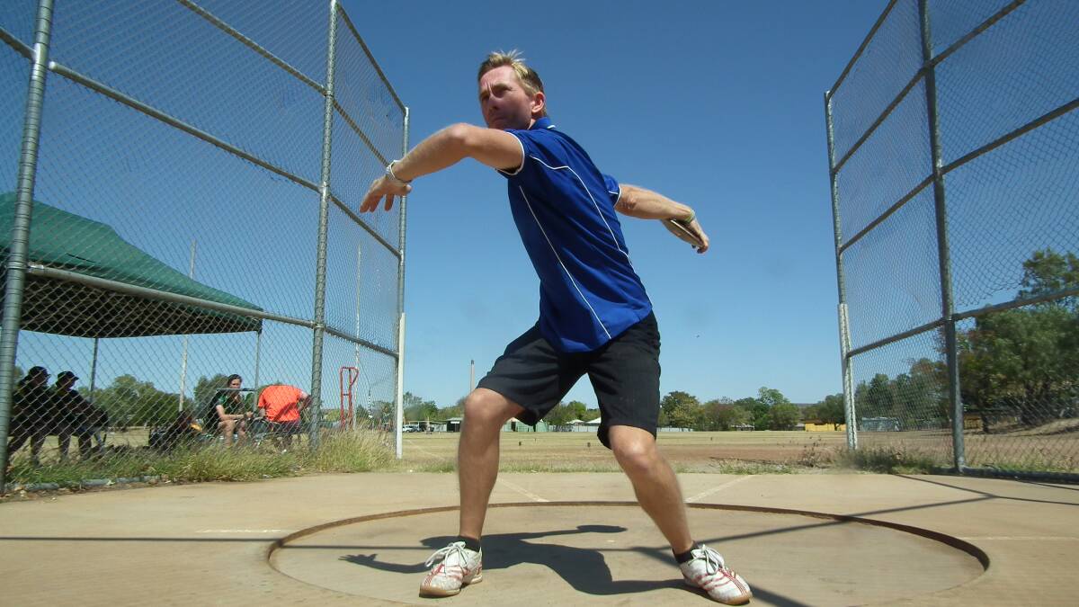 READY TO LAUNCH: David Scott winding up for discus at last year's event. .Photos: Supplied.