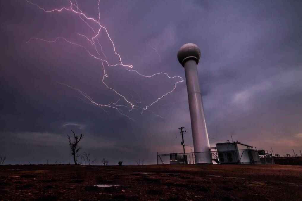 ELECTRIC: Lightning flashes around the Dopler Radar on Telstra Hill, early December.