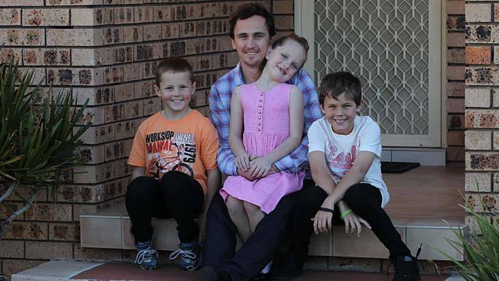 Raising awareness … Paul Bourke with his children Kai, 8, Maddison, 6, and Josh, 10.