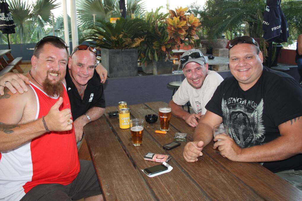 MATES: Sharing a cold one are, from left, Matt Robinson, BJ Picone, "Snip" Longueville and "Sooty" Churchill.
