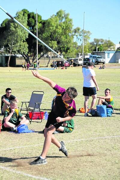 THE AIR UP THERE: Liam Sweeney gets plenty of height as he unleashes a throw during his javelin event at the Mount Isa Athletics Club meeting on Saturday. - Picture: LYNDON KEANE/2919