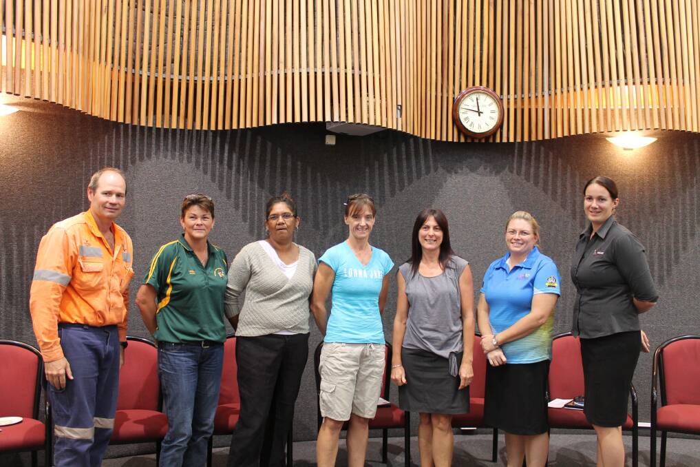 COMMUNITY GRANT RECIPIENTS: From left, Softball association members Stephen Nilsson, Linda King and Patricia Richards, Happy Valley Kindy president Kerry Cairns, Isa Rats committee members Kylie Baker and Michelle Lee and Bonnie MacRae from MIGATE. - Picture: JASMINE BARBER/7547