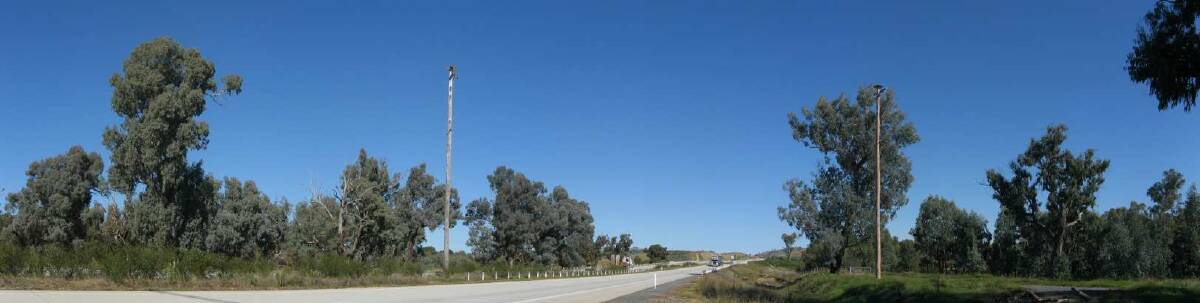 Two of the 'mystery' poles on the Hume Highway