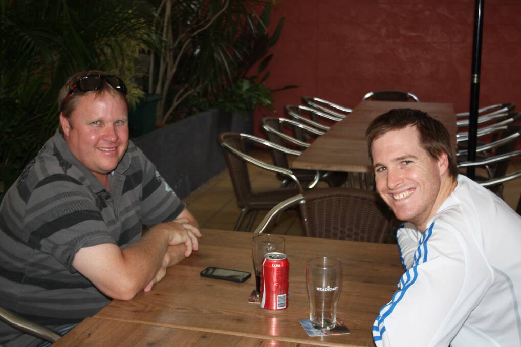 HAPPY TIMES: Sharing a drink and a laugh are Peter Lambert, left and Jarrod Horne.