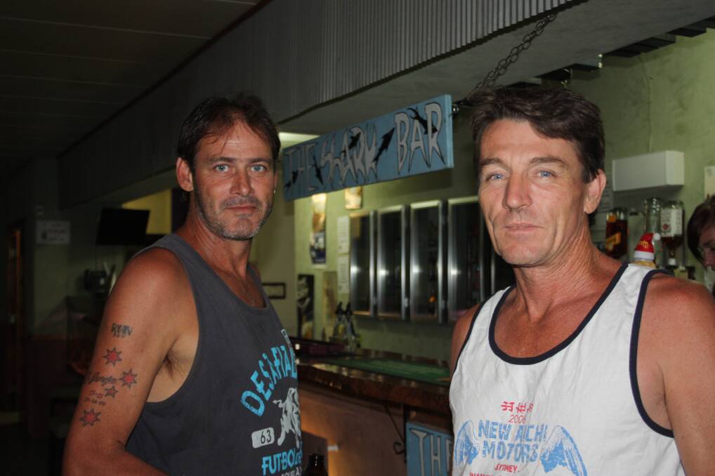 RELAXED: Taking time out at The Shark bar are Dave Hartin, left and Shane Lambert.