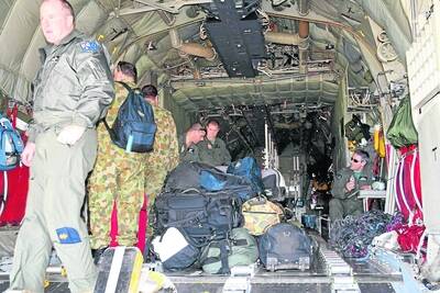 INSIDE THE BEAST: The cadets were to sit on webbing fold down seats inside the Hercules, and prepared for a noisy ride.