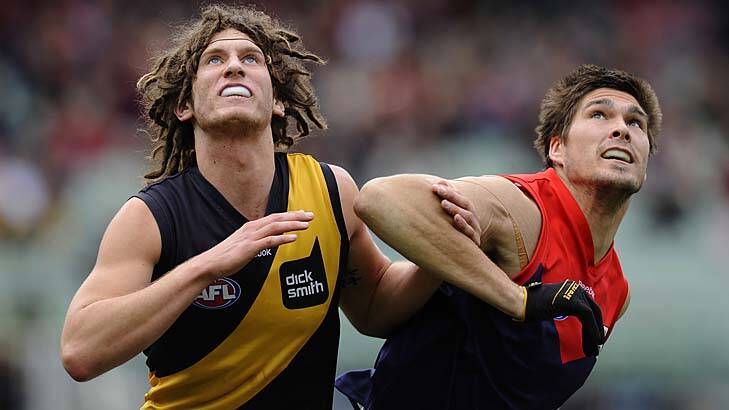 Melbourne's Paul Johnson (right), seen with Richmond's Tyrone Vickery during round 18 in 2009, has added fuel to the fire over the tanking allegations.