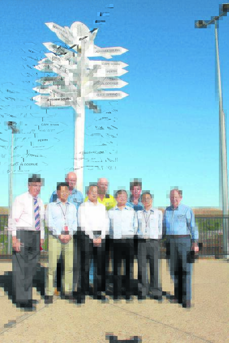 ALL THE WAY TO CHINA: Representatives from Y&J Industries, Xstrata, Mount Isa City Council, and Barkly Engineering met to unveil the new sign at the lookout. - Picture: JASMINE BARBER/7546