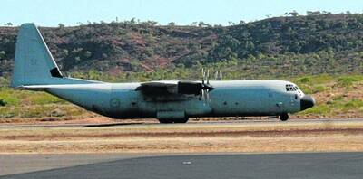 BIG AND HEAVY: The C130J Hercules lumbers down the runway at Mount Isa Airport, ready to take off for Brisbane.