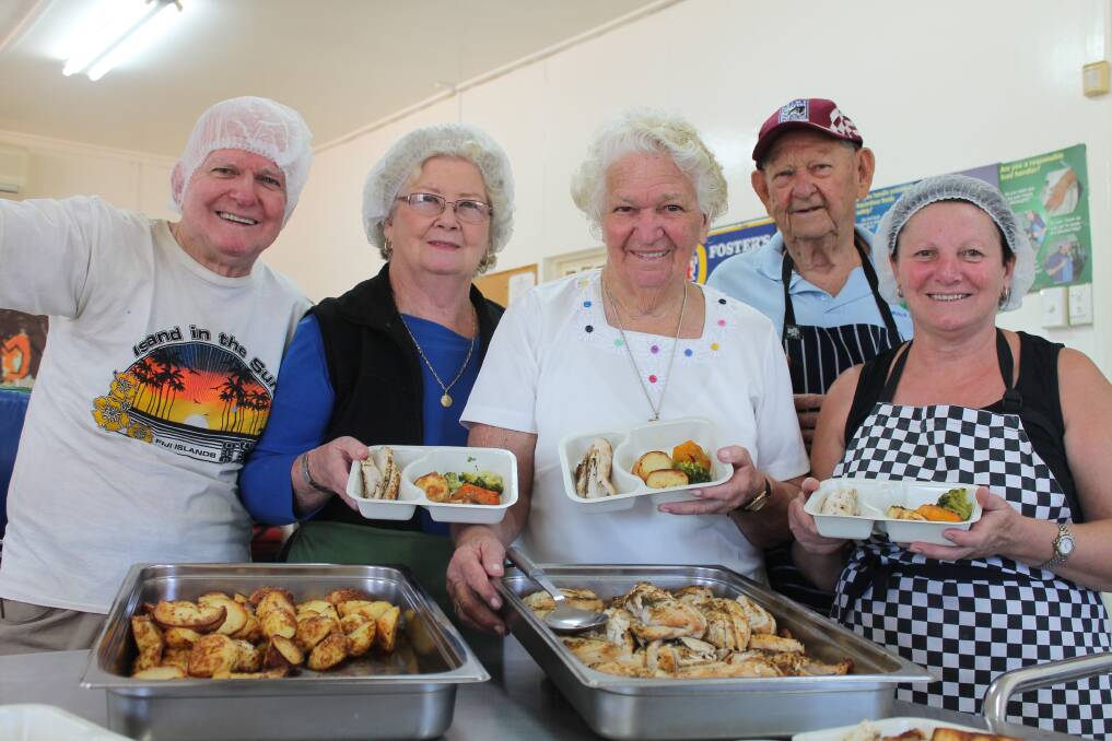 CELEBRATION: Mount Isa Meals on Wheels members Graham Brennan, Desley Whitehead, Anne Morris, Arthur Morris, and Tabo Edmonds celebrate the 60th anniversary of National Meals on Wheels Day. - Picture: JASMINE BARBER/7938