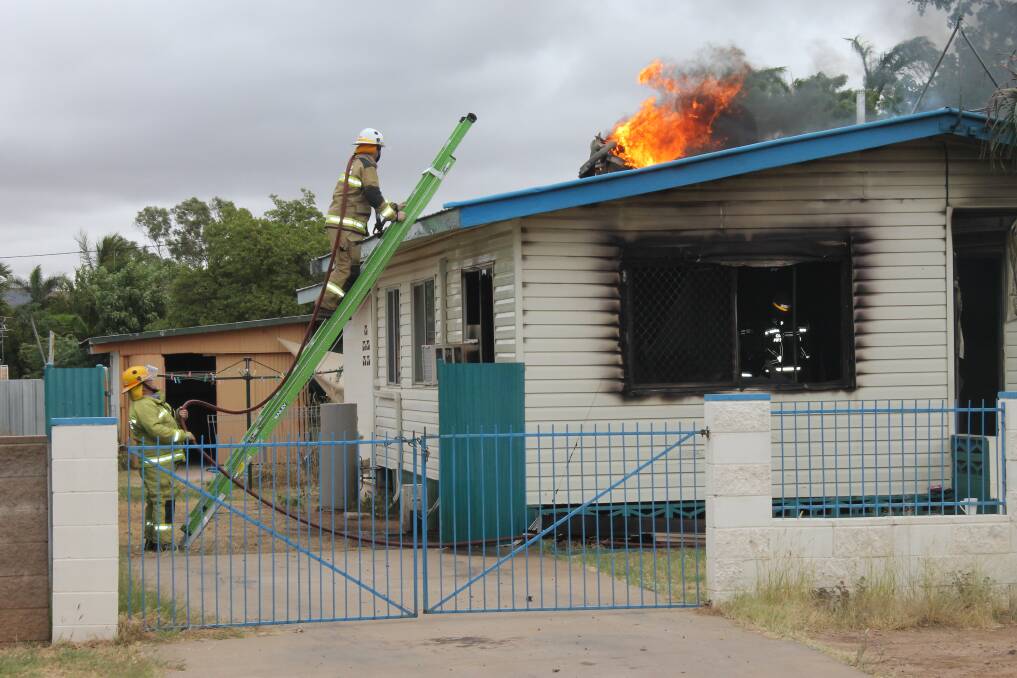 FIRE: Crews fight the blaze at 3 Campbell Street yesterday. - Pictures: HAILEY RENAULT/7355