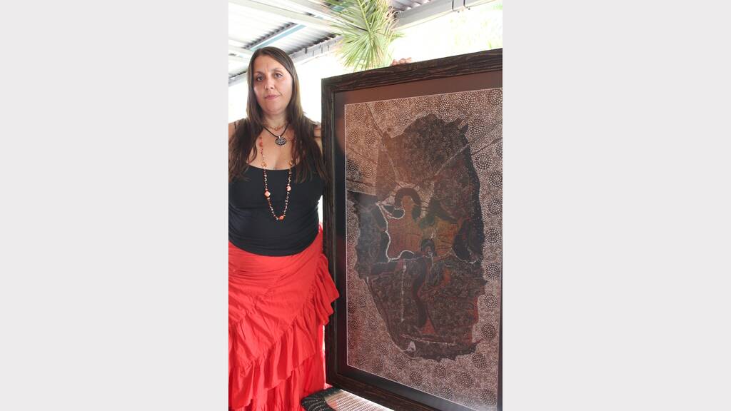 Artist Sonja Clark with her piece `Wandjina in the Rock', which was selected to enter the prestigious Stanthorpe Art Festival held next month.  - Picture: JASMINE BARBER/ 8757