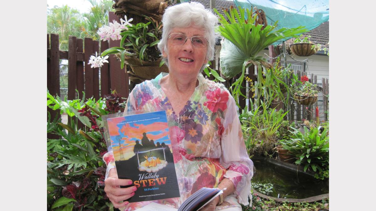 Former Mount Isa resident Di Perkins with her latest book Wallaby Stew Inspiring Stories from Down Under , which is available now.