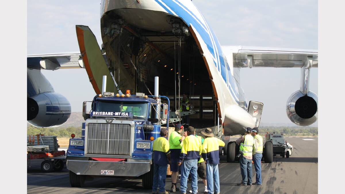 HEAVY CARGO: Airport officials removing Incitec Pivot's piece of machinery from the Russian Ilyushin I1-76 at the Mount Isa Airport yesterday. - Picture: ROZ FISHER/4960
